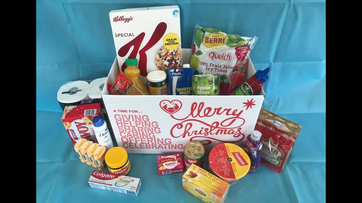 Filled Christmas box with food items